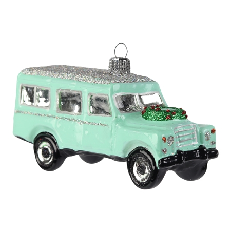 Pastel mint green off-road car with Christmas wreath